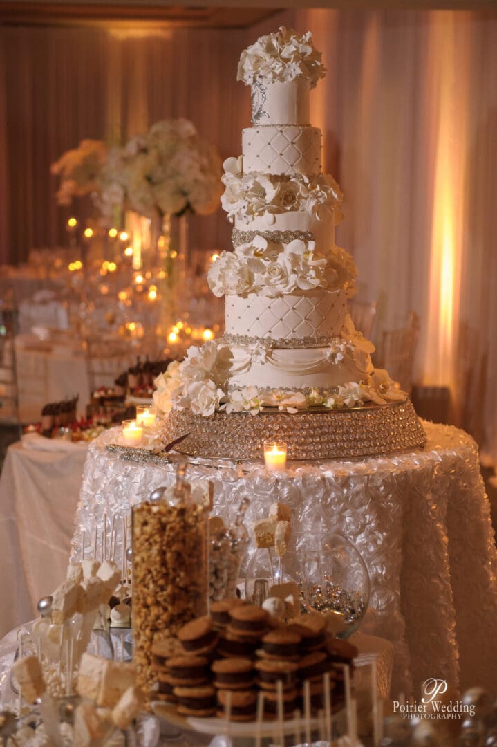 A wedding cake is on top of the table.